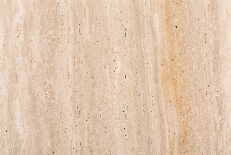 Beige Romeins travertijn natuursteen close-up